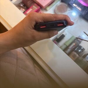 Black Portable Power Bank with Pink USB Ports